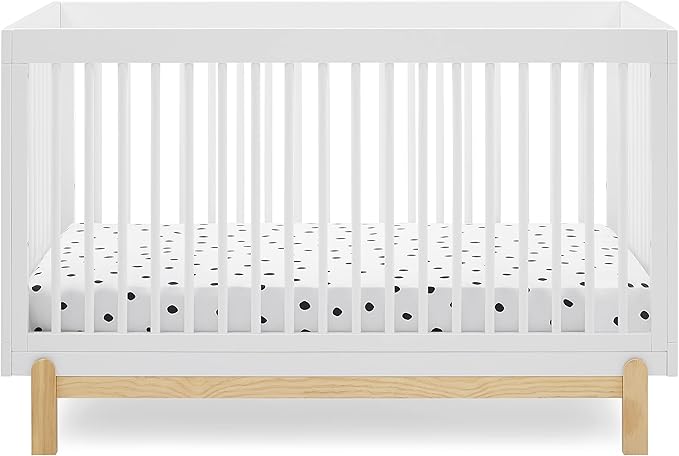 Delta Children Poppy 6-Piece Baby Nursery Furniture SetIncludes: Convertible Crib, Dresser, Changing Top, Mattress, Sheets, & Changing Pad, Bianca White w/Natural