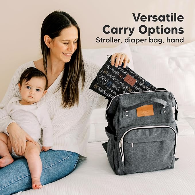 KeaBabies Portable Diaper Changing Pad - Large Waterproof Baby Changing Mat, Compact Travel Diaper Clutch, Functional Pockets Fit Newborn Essentials, Wipeable & Padded Baby Changer (Pixel)