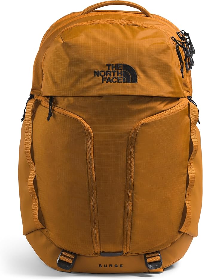THE NORTH FACE Surge Commuter Laptop Backpack | Daypack with Water Repellent Finish, 16" Laptop Sleeve, Reflective Details, Timber Tan, One Size